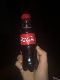 Coke  Original in bottle 253 ml
